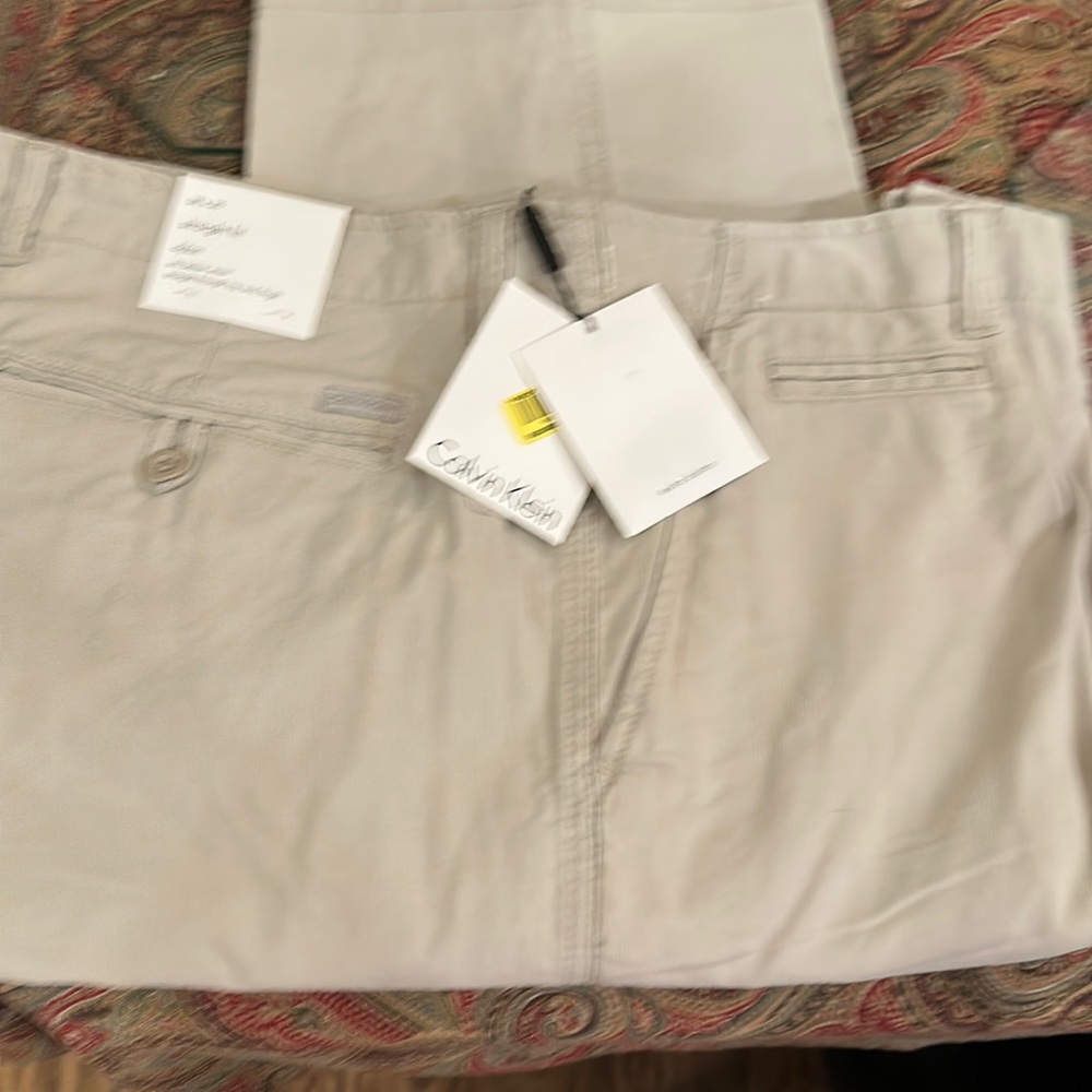 Calvin Klein new with tags 38 wx30l straight fit light color  khaki type pants